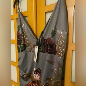 Mini grey floral strappy dress.